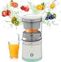 Juicer with a glass of orange juice and various fruits in the background