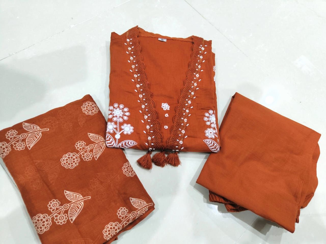 Embroidered kurta with pearl detailed neckline with pockets on sides with pants and printed malmal  dupatta