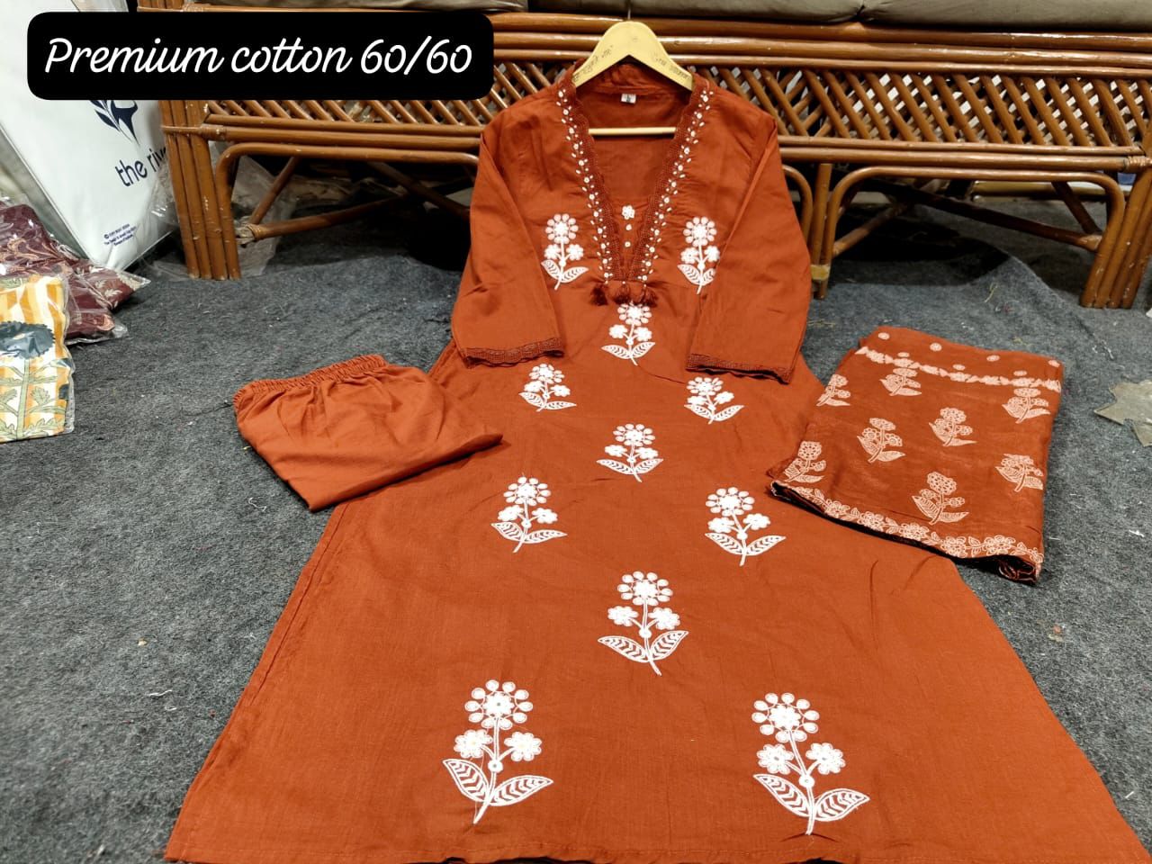 Embroidered kurta with pearl detailed neckline with pockets on sides with pants and printed malmal  dupatta